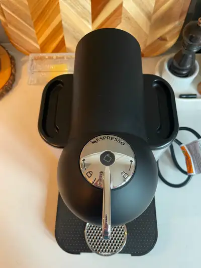 This is a Nespresso Vertuo coffee maker. We have had it for a few years but it has been very well ma...