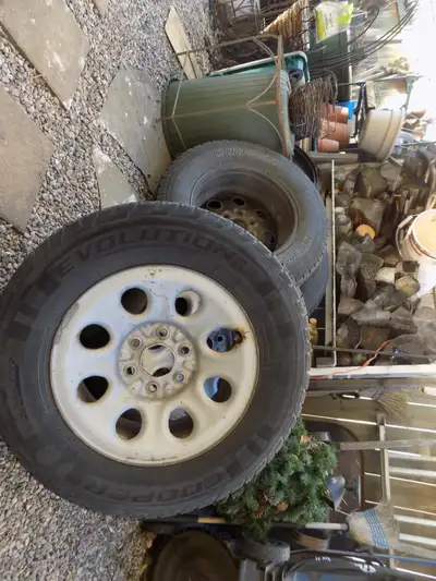 Full set of 4 rims with centers & nuts/bolts. For Chevy or GMC truck- Cochrane area- text of call @...