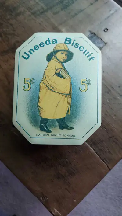 This Uneeda Biscuit tin is a reproduction. In great shape. Clean inside. Pet and smoke free home.