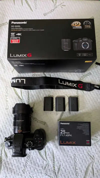 Lumix GH5 with extra lenses and batteries, View more