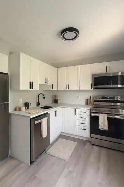 Be the first to live in this newly built second-floor unit, thoughtfully designed for comfort, style...