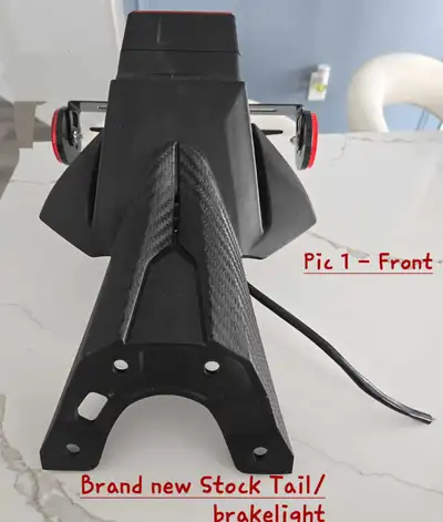 New stock parts - Motorcycle was stolen. Exhaust $250.00 Tail light/Brake light package $250.00 Seat...