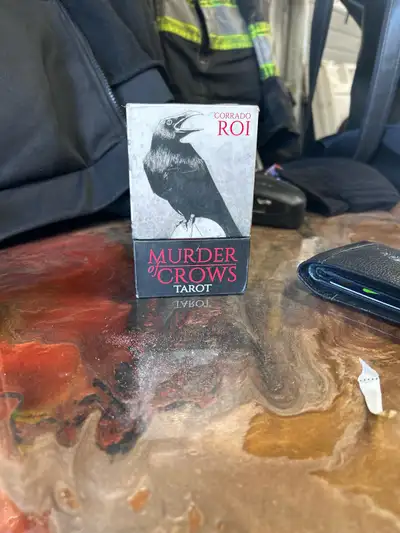 Delve into the mysteries of the Murder of Crows Tarot deck, a captivating tool for divination. This...