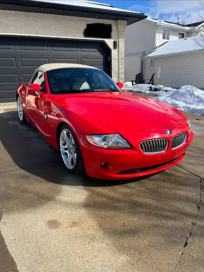 2004 BMW Z4 3.0l Roadster 3.0 liter inline 6 cyl engine 6 speed Manual transmission w/sport mode Tan...