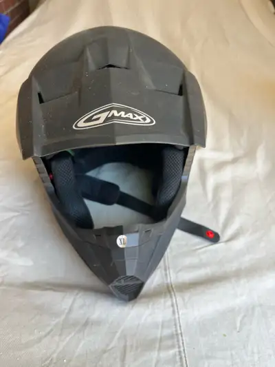 Three virtually brand new G FORCE ATV/Dirt bike helmets and 1 pair of clear goggles. ALL 3 helmets a...