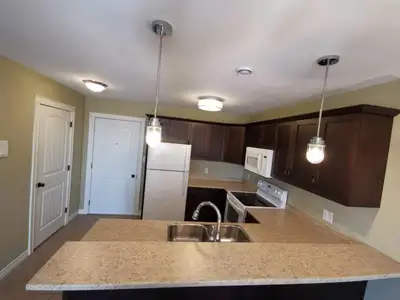 Open concept spacious living room/kitchen,kitchen with lots of cupboards . Bath with full soaking tu...