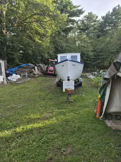 20 Foot Cape Boat. Fiberglass. 50 Mercury Outboard.