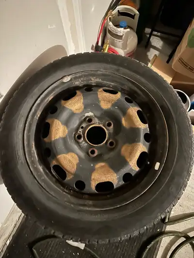 Used winter tires on steelies. Fits 2015 Mazda 3. 205/55R16 Two tires have maybe one season left on...