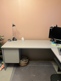Grey office desk with two drawers and keyboard tray