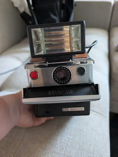Polaroid sx70 magic flash, View more