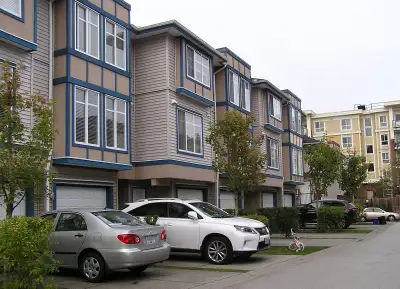 Spacious 3 level 4 bedroom, 2 1/2 bathroom townhouse with two balconies and 2 parking located at 138...