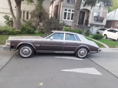 Cadillac delegance 2 tone brown Body is solid Runs well