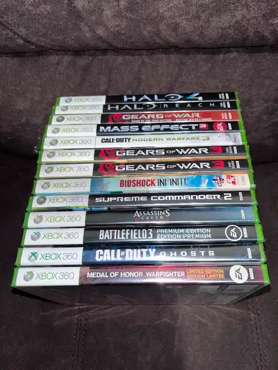 assorted xbox 360 video games still wrap in cellophane. all 13 games 480$ or 40$ each.