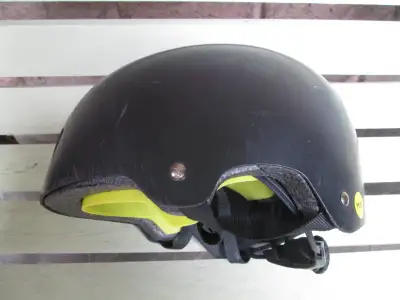 Kid's bike helmet. Rated for ages 5 to 8. Made by "Nutcase" with patented Speedial for adjustable fi...