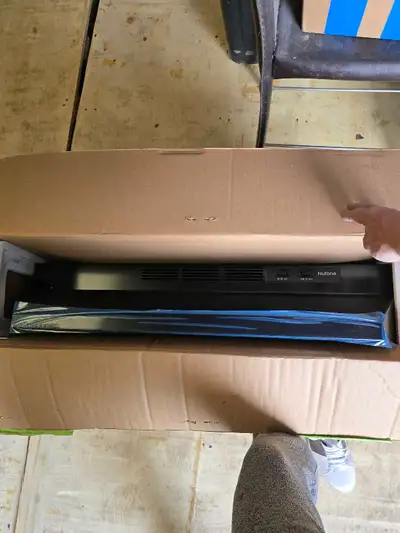 This is a new 30-inch Nutone range hood, model NU230BL, designed for effective kitchen ventilation a...