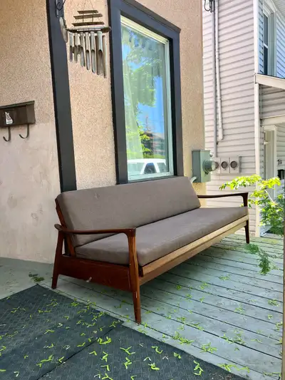 Mid century teak sofa bed / daybed In excellent condition Folds down to a bed. Very comfortable Colo...