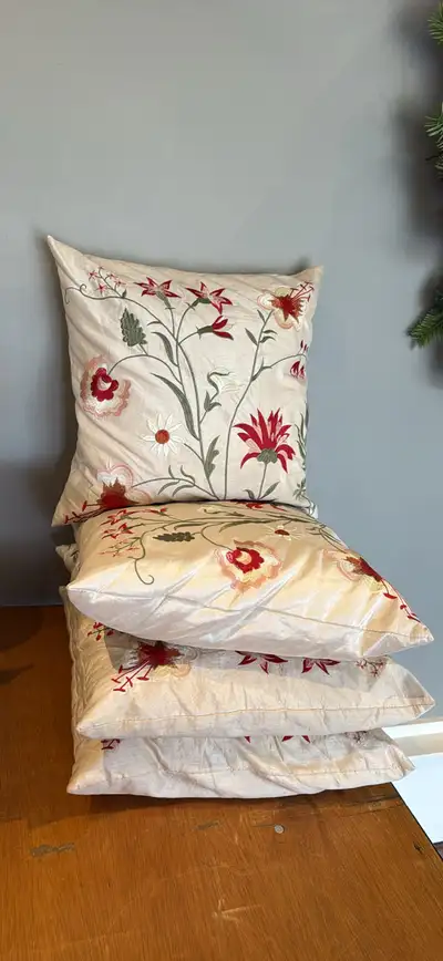 Add a touch of elegance to your home decor with this set of four accent pillows, each measuring 18x1...