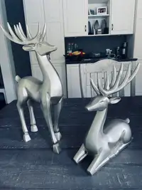 2 decorative deer statues