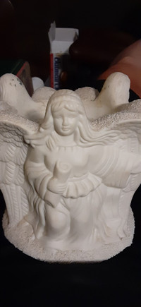 Angel candle holder