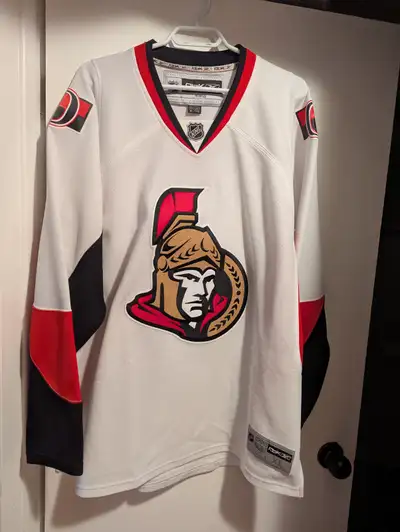 tons of items including dvds, blue rays, various video games and accessories, a white XL Reebok sens...