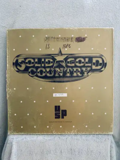 For sale is a 'Solid Gold Country' LP collection from September 15, 1986. These records were origina...