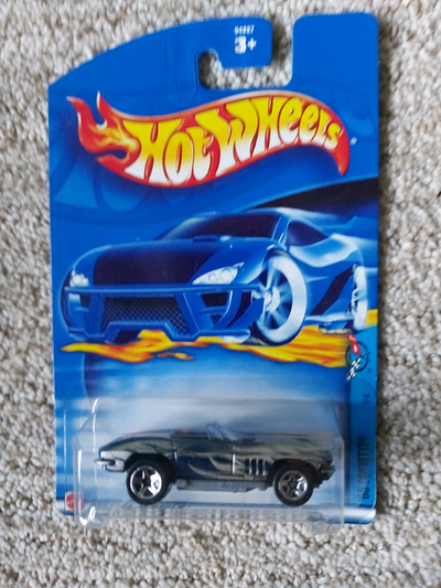 Hotwheels Corvette 4 car set 1- 1965 Corvette 2- 1997 Corvette 3- 1958 Corvette 4- 1963 Corvette Min...