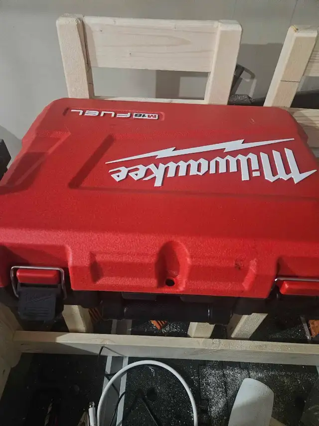 Milwaukee M18 Fuel Hammer Drill with two batteries - Never Used 628637317253131219