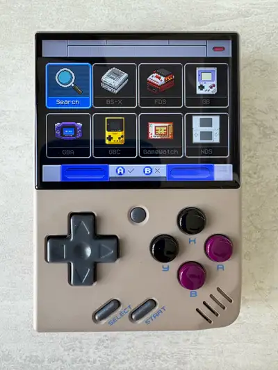Selling my Miyoo Mini V4 in the classic NES colorway – a tiny but mighty handheld retro gaming conso...