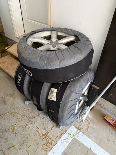 I'm selling a set of used Audi summer tires complete with rims, size 225/45R17. These Continental ti...