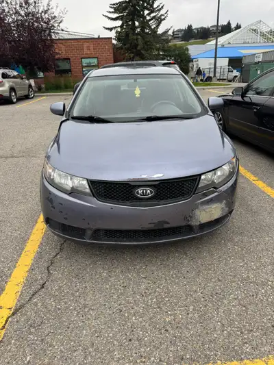 Looking for an affordable, fuel-efficient daily driver? This 2010 Kia Forte LX is a great choice! Lo...
