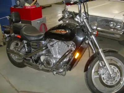 1999 Honda Shadow VT 1100 , 26,000 km , very nice condition . Asking $2800. OBO 226-930-9524