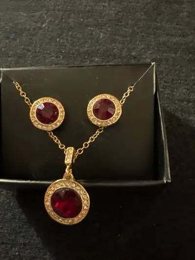 January birthstone Garnet. Angelic sparkling round garnet red necklace and earrings Never worn. 17 i...