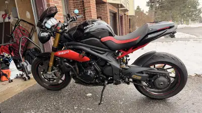 2014 Triumph Speed Triple. Bike is in immaculate condition and has a series of high-performance upgr...