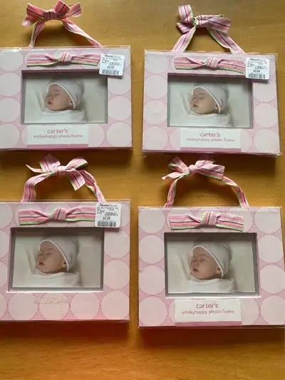 -“Carter’s” brand photo frames -Brand new!! -Price: $6.00 EACH (FIRM) -Available: 4 identical frames...