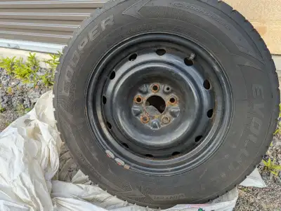 These Cooper Evolution winter tires are nearly brand new, sized 225/65R16, come mounted on durable s...