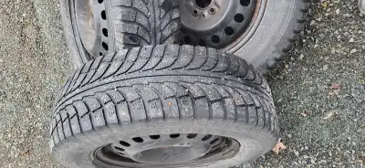 235/65R17 Winter Tires on rims stud spacing is 5x114.5 good for another season also will throw in hu...