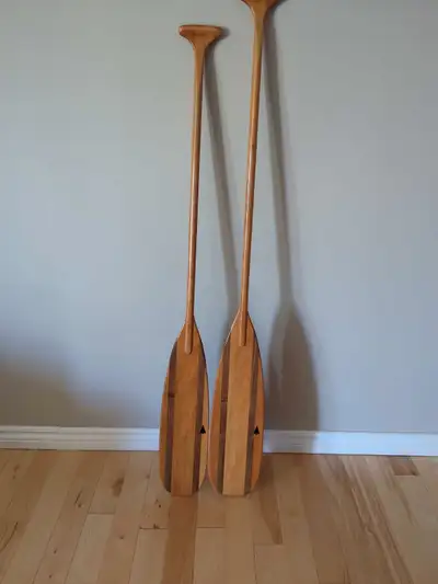 Laminated had made Cherry and Walnut paddles. 57" & 55" beaver tail and 61" Otter tail. Lightweight...
