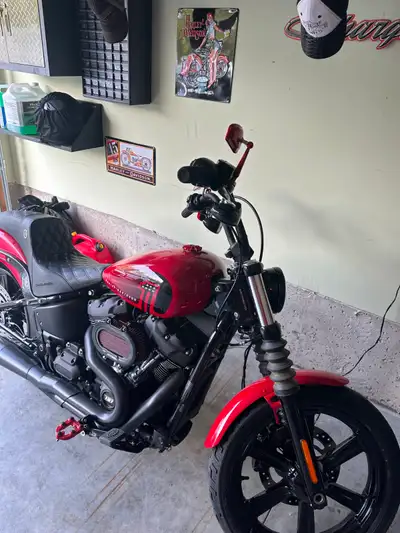 For Sale: 2022 Harley Davidson Street Bob in redline red. Bike is equipped with a 131 Screamin Eagle...
