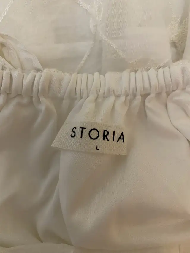 Storia white babydoll dress63654761381763122