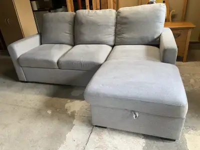 Light grey sleeper sectional in good condition, just shampooed . Light wear n tear with use . 87 x 6...