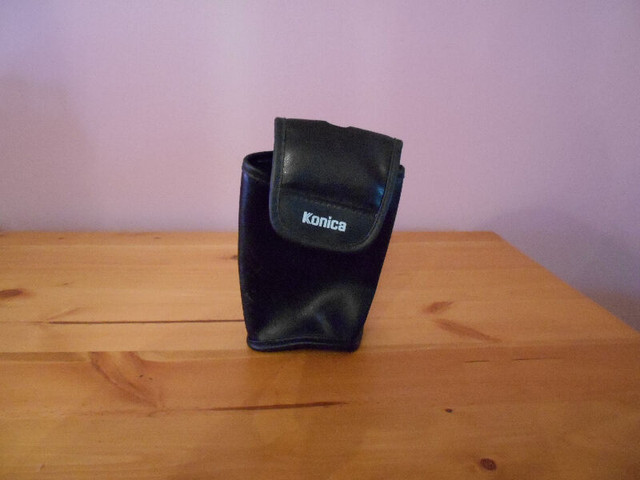 konica leather pouch /i-pod case/ear phones in Cell Phone Accessories in Kawartha Lakes