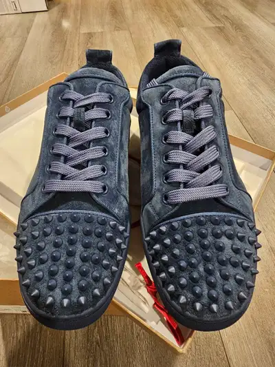 Brand new Christian Louboutin blue suede sneakers, a size 8US complete with the original box and dus...