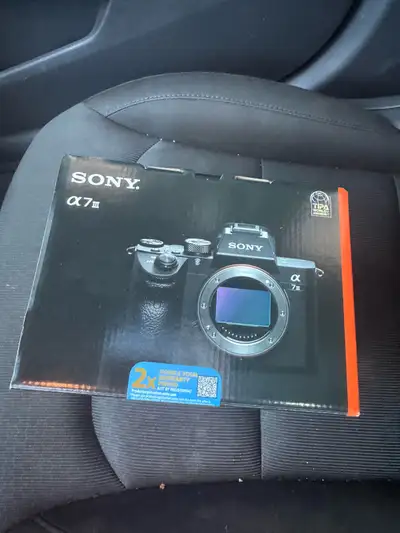 Capture stunning high-resolution images with this Sony Alpha a7 III mirrorless camera, featuring a 2...