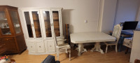 Large solid wood table, chairs and cabinet/buffet.