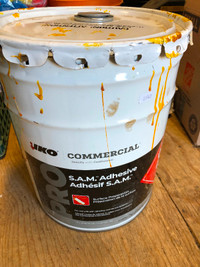 Adhesive primer for roofing