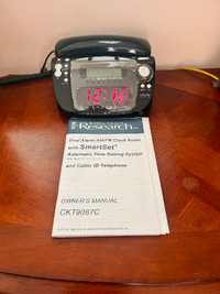 Dual Alarm AM/FM Clock Radio with SmartSetAutomatic Time Set