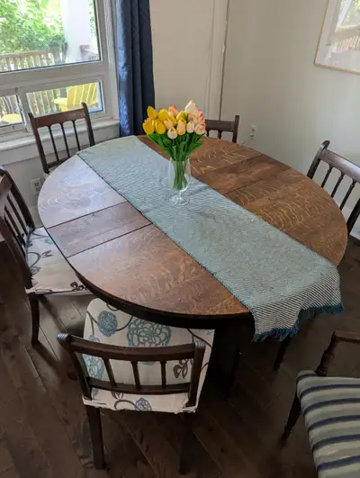 Antique dining table and 6 chairs, View more