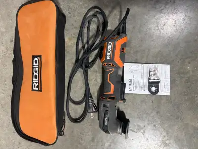 I'm selling a Ridgid multi-tool in used condition, perfect for various cutting and sanding tasks. Th...
