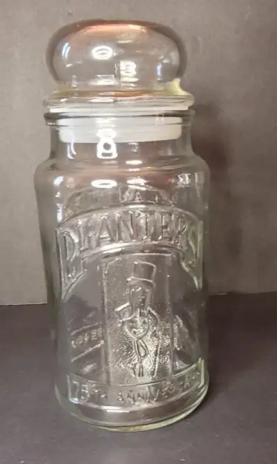 Vintage PLANTERS PEANUT GLASS JAR 75 YEAR ANNIV. WITH STOPPER, View more