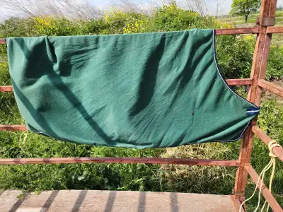 75" bucas terry cloth fitted green cooler. The tag says 6'6" but it fits small. A few small holes bu...